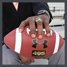 Antron holding a football